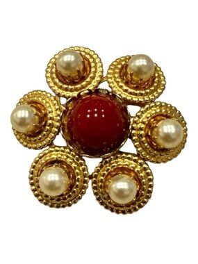 Vintage gold tone brooch with pearls and red stone